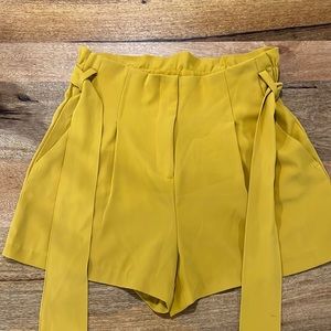 Dynamite Gold dress shorts, tie belt
